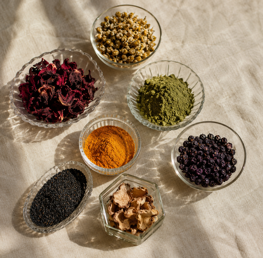 Crystal bowls with natural ingredients on cream linen